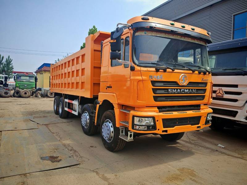 Orange SHACMAN 8x4 dump truck